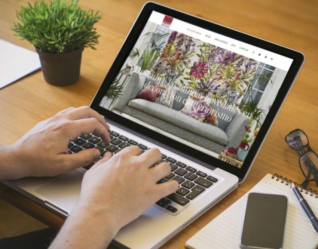 Businessman at work. Close-up top view of man working on laptop password. All screen graphics are made up.